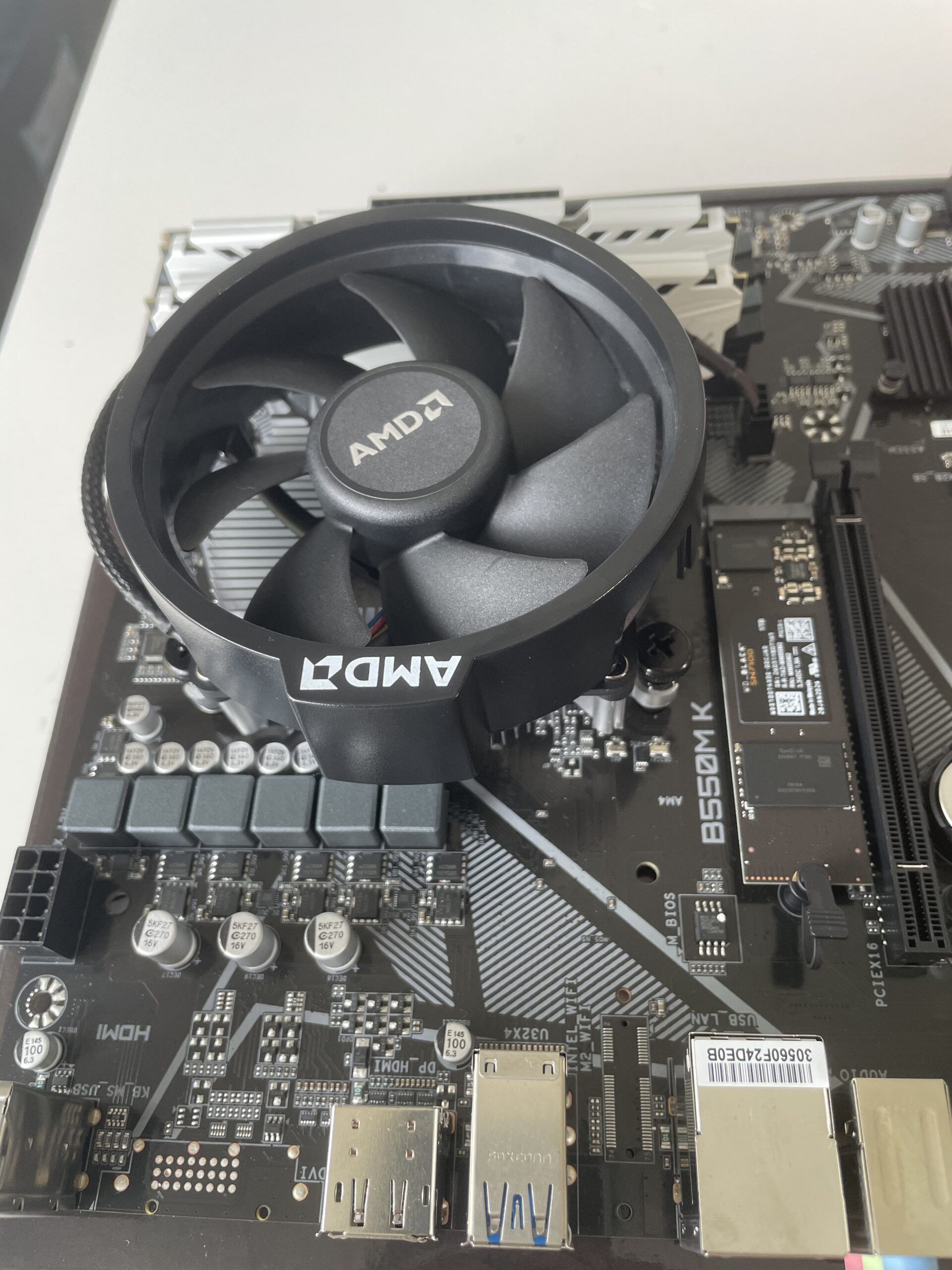 AMD Ryzen CPU cooler attached to motherboard
