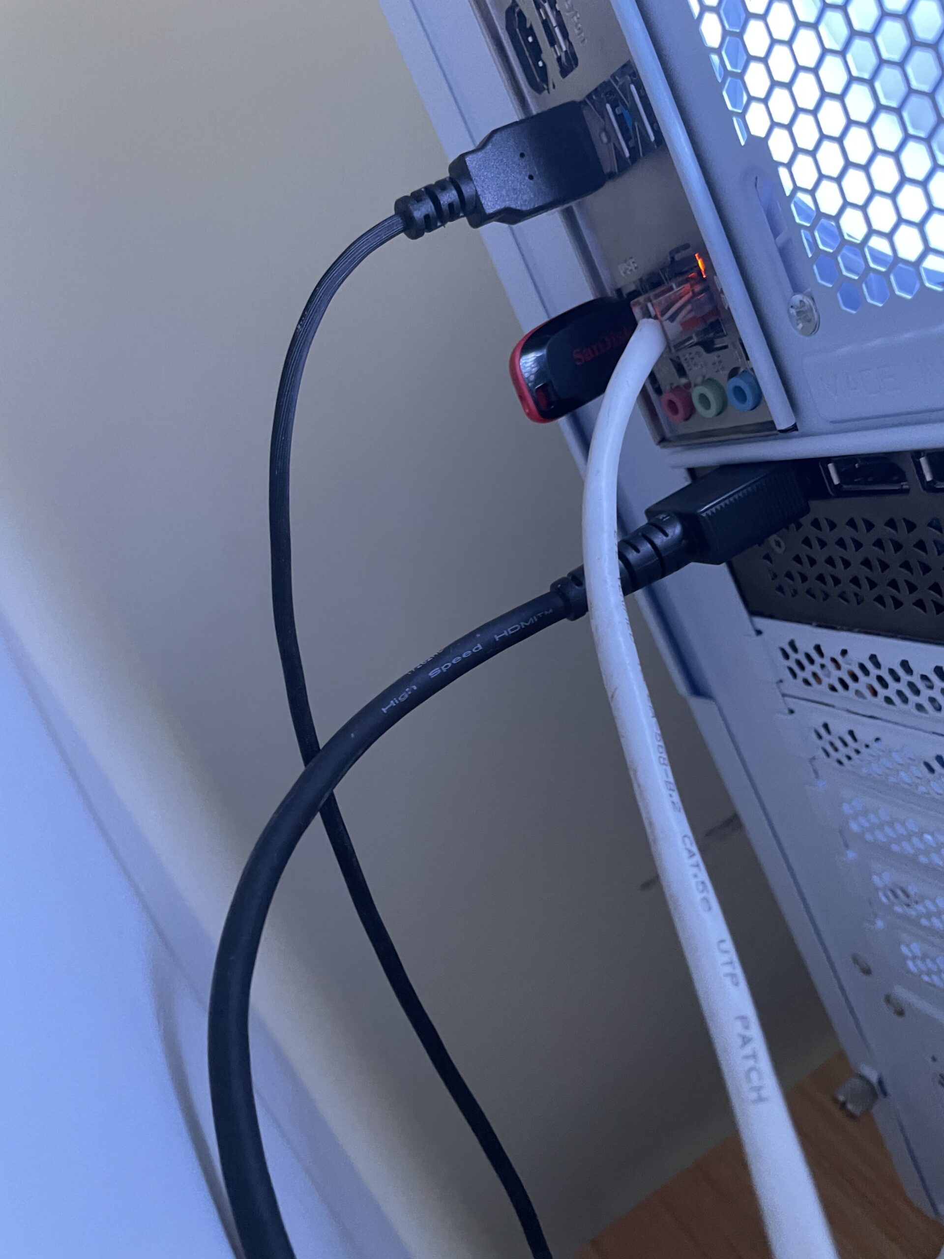 Windows boot pen-drive inserted into the back of the new PC. 